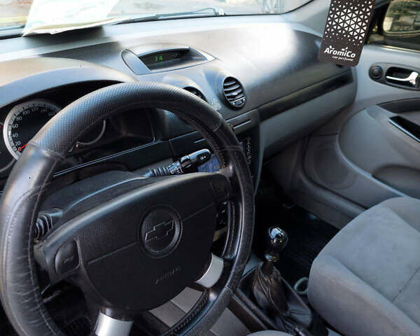 Черный Шевроле Лачетти, объемом двигателя 1.8 л и пробегом 257 тыс. км за 4200 $, фото 16 на Automoto.ua