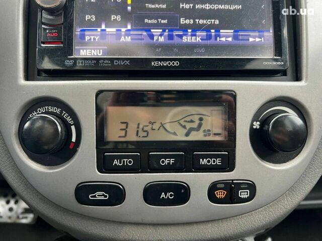 Черный Шевроле Лачетти, объемом двигателя 1.8 л и пробегом 293 тыс. км за 4190 $, фото 24 на Automoto.ua