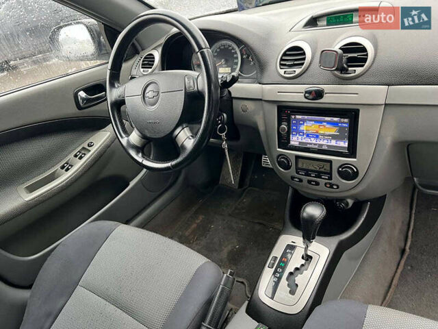 Черный Шевроле Лачетти, объемом двигателя 1.8 л и пробегом 293 тыс. км за 4190 $, фото 37 на Automoto.ua