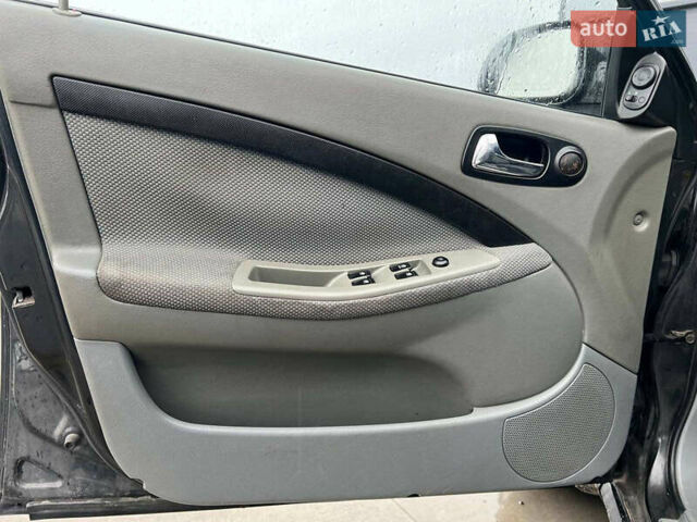 Черный Шевроле Лачетти, объемом двигателя 1.8 л и пробегом 293 тыс. км за 4190 $, фото 14 на Automoto.ua