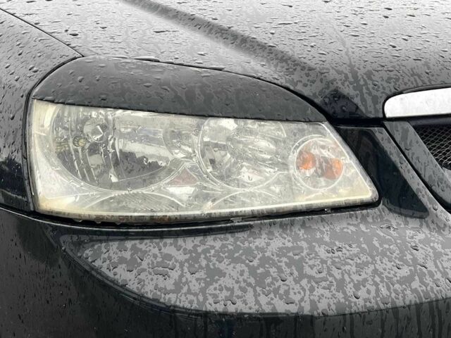 Черный Шевроле Лачетти, объемом двигателя 1.8 л и пробегом 293 тыс. км за 4190 $, фото 12 на Automoto.ua