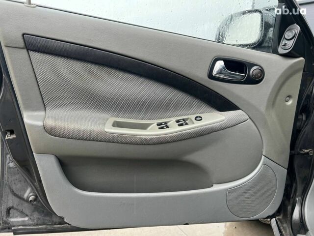 Черный Шевроле Лачетти, объемом двигателя 1.8 л и пробегом 293 тыс. км за 4190 $, фото 14 на Automoto.ua