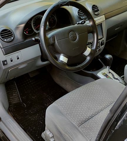 Черный Шевроле Лачетти, объемом двигателя 1.8 л и пробегом 176 тыс. км за 3500 $, фото 6 на Automoto.ua