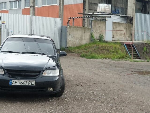 Черный Шевроле Лачетти, объемом двигателя 1.8 л и пробегом 330 тыс. км за 3846 $, фото 1 на Automoto.ua