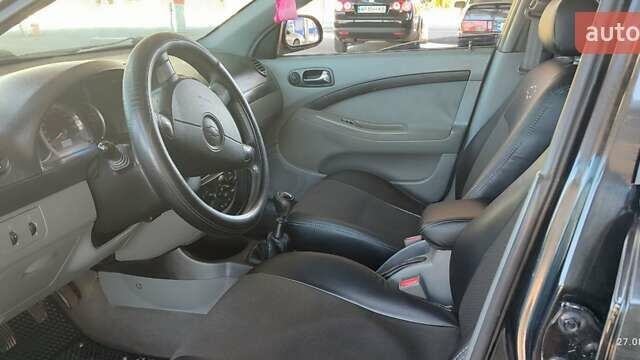 Черный Шевроле Лачетти, объемом двигателя 1.8 л и пробегом 217 тыс. км за 5300 $, фото 10 на Automoto.ua