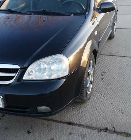 Черный Шевроле Лачетти, объемом двигателя 1.8 л и пробегом 210 тыс. км за 3800 $, фото 1 на Automoto.ua