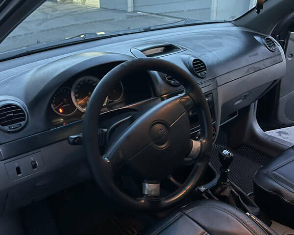 Чорний Шевроле Лачетті, об'ємом двигуна 1.8 л та пробігом 237 тис. км за 3599 $, фото 13 на Automoto.ua