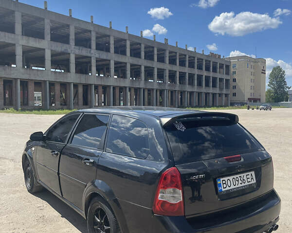 Черный Шевроле Лачетти, объемом двигателя 1.8 л и пробегом 350 тыс. км за 3400 $, фото 6 на Automoto.ua