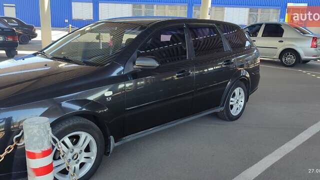 Черный Шевроле Лачетти, объемом двигателя 1.8 л и пробегом 217 тыс. км за 5300 $, фото 15 на Automoto.ua