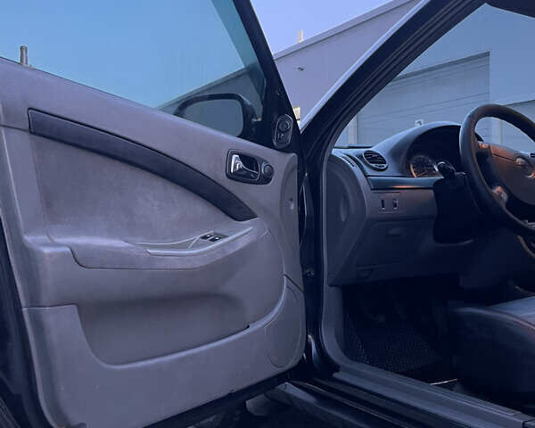 Чорний Шевроле Лачетті, об'ємом двигуна 1.8 л та пробігом 237 тис. км за 3599 $, фото 12 на Automoto.ua