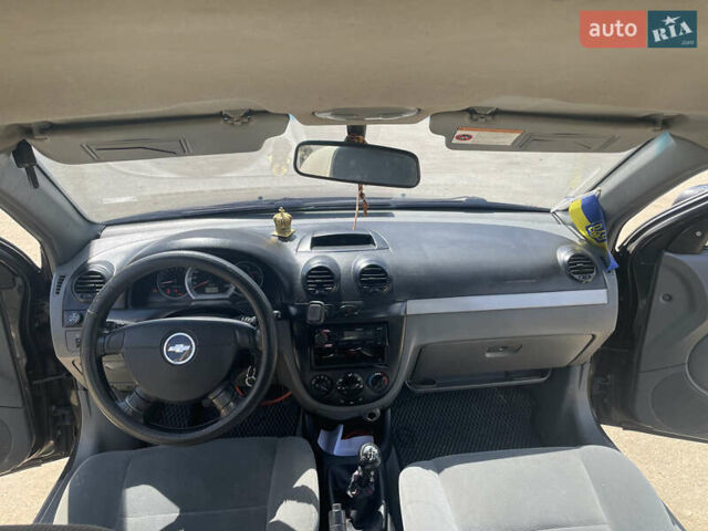 Черный Шевроле Лачетти, объемом двигателя 1.8 л и пробегом 350 тыс. км за 3400 $, фото 11 на Automoto.ua