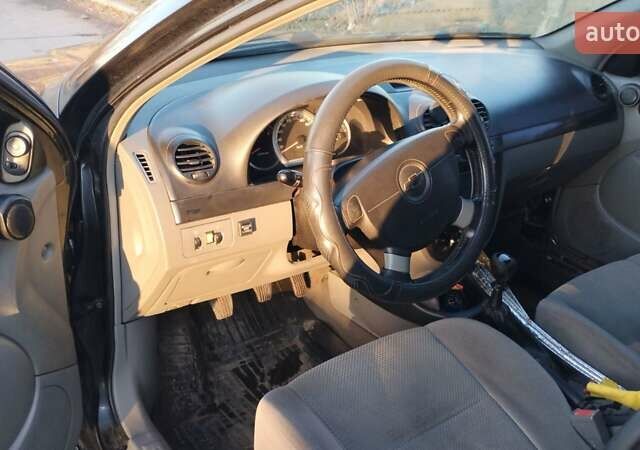 Черный Шевроле Лачетти, объемом двигателя 1.8 л и пробегом 210 тыс. км за 3800 $, фото 16 на Automoto.ua