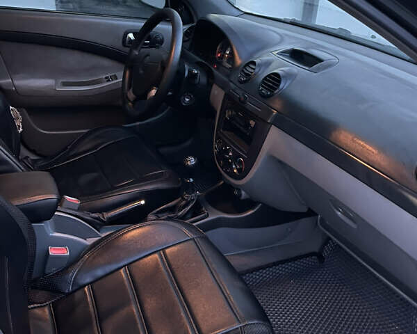 Чорний Шевроле Лачетті, об'ємом двигуна 1.8 л та пробігом 237 тис. км за 3599 $, фото 15 на Automoto.ua