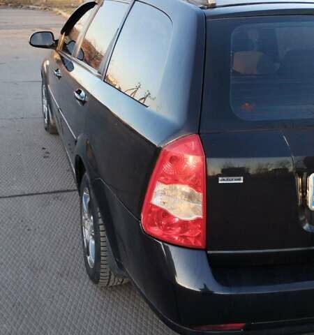 Черный Шевроле Лачетти, объемом двигателя 1.8 л и пробегом 210 тыс. км за 3800 $, фото 10 на Automoto.ua