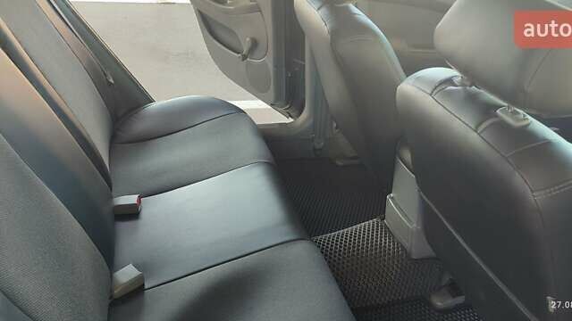 Черный Шевроле Лачетти, объемом двигателя 1.8 л и пробегом 217 тыс. км за 5300 $, фото 5 на Automoto.ua