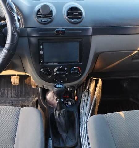 Черный Шевроле Лачетти, объемом двигателя 1.8 л и пробегом 210 тыс. км за 3800 $, фото 14 на Automoto.ua