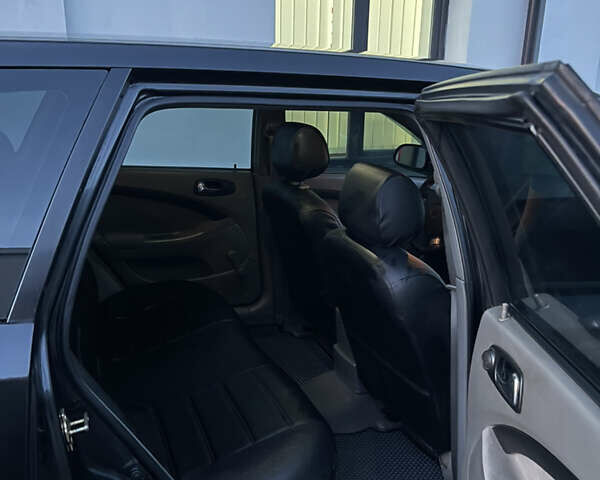 Чорний Шевроле Лачетті, об'ємом двигуна 1.8 л та пробігом 237 тис. км за 3599 $, фото 18 на Automoto.ua