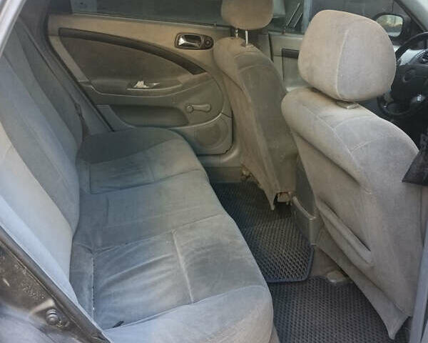 Черный Шевроле Лачетти, объемом двигателя 1.8 л и пробегом 425 тыс. км за 2700 $, фото 10 на Automoto.ua