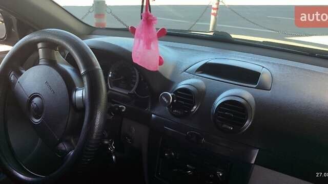 Черный Шевроле Лачетти, объемом двигателя 1.8 л и пробегом 217 тыс. км за 5300 $, фото 17 на Automoto.ua