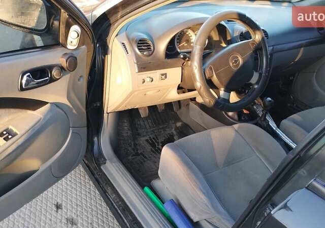 Черный Шевроле Лачетти, объемом двигателя 1.8 л и пробегом 210 тыс. км за 3800 $, фото 11 на Automoto.ua