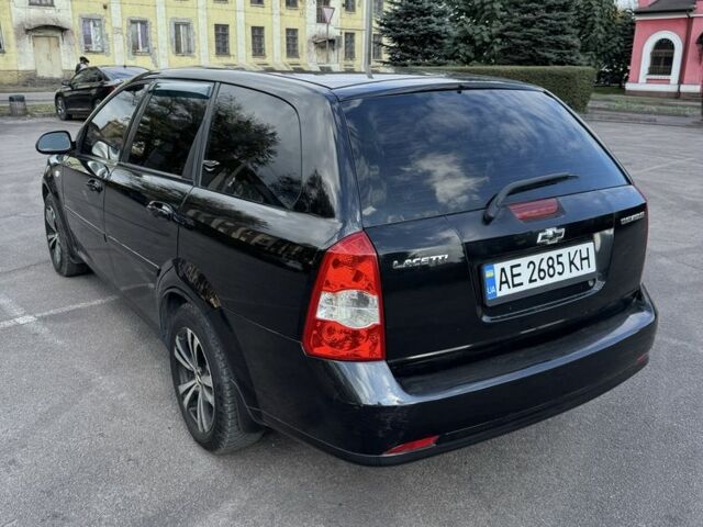 Черный Шевроле Лачетти, объемом двигателя 1.8 л и пробегом 210 тыс. км за 3800 $, фото 4 на Automoto.ua