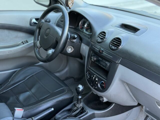 Черный Шевроле Лачетти, объемом двигателя 1.8 л и пробегом 220 тыс. км за 3499 $, фото 12 на Automoto.ua