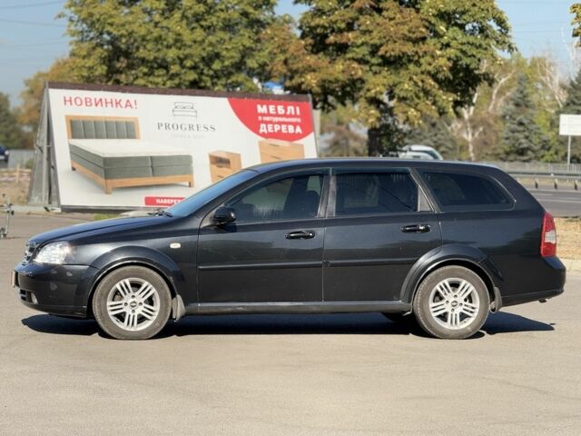 Черный Шевроле Лачетти, объемом двигателя 1.8 л и пробегом 220 тыс. км за 3499 $, фото 1 на Automoto.ua