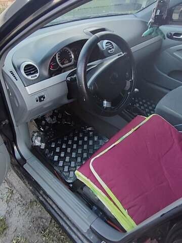 Чорний Шевроле Лачетті, об'ємом двигуна 1.8 л та пробігом 450 тис. км за 2900 $, фото 4 на Automoto.ua