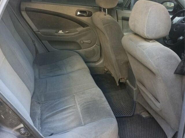 Черный Шевроле Лачетти, объемом двигателя 1.8 л и пробегом 400 тыс. км за 2500 $, фото 11 на Automoto.ua