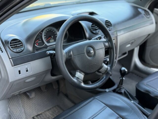 Черный Шевроле Лачетти, объемом двигателя 1.8 л и пробегом 220 тыс. км за 3499 $, фото 8 на Automoto.ua