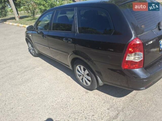 Черный Шевроле Лачетти, объемом двигателя 1.8 л и пробегом 300 тыс. км за 3000 $, фото 7 на Automoto.ua