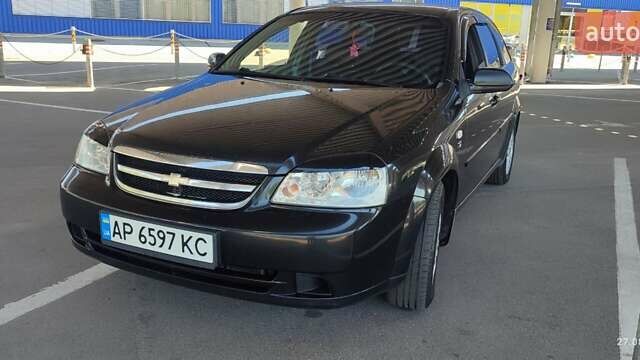Черный Шевроле Лачетти, объемом двигателя 1.8 л и пробегом 217 тыс. км за 5300 $, фото 6 на Automoto.ua