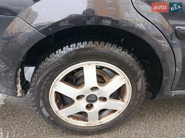 Черный Шевроле Лачетти, объемом двигателя 1.6 л и пробегом 193 тыс. км за 4500 $, фото 13 на Automoto.ua