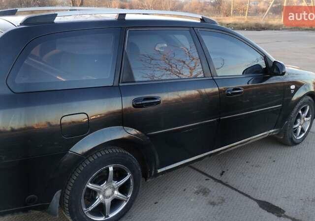 Черный Шевроле Лачетти, объемом двигателя 1.8 л и пробегом 210 тыс. км за 3800 $, фото 4 на Automoto.ua