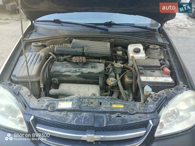 Черный Шевроле Лачетти, объемом двигателя 1.8 л и пробегом 425 тыс. км за 2700 $, фото 14 на Automoto.ua