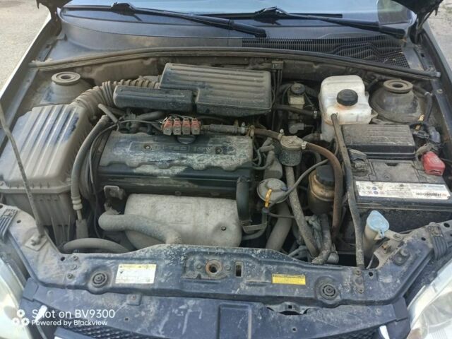 Черный Шевроле Лачетти, объемом двигателя 1.8 л и пробегом 400 тыс. км за 2500 $, фото 9 на Automoto.ua