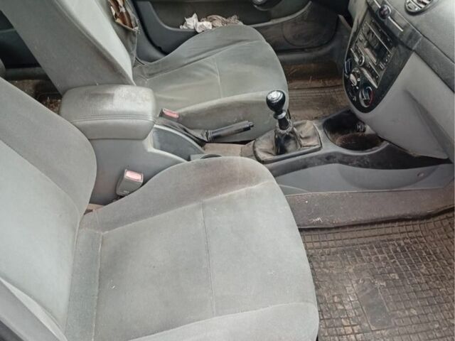 Черный Шевроле Лачетти, объемом двигателя 1.8 л и пробегом 232 тыс. км за 1191 $, фото 4 на Automoto.ua