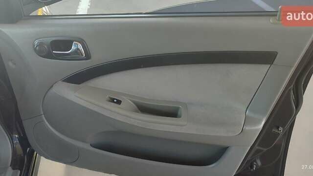 Черный Шевроле Лачетти, объемом двигателя 1.8 л и пробегом 217 тыс. км за 5300 $, фото 11 на Automoto.ua