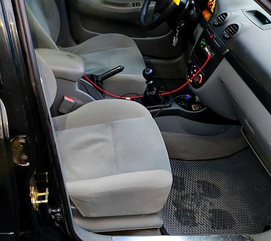 Черный Шевроле Лачетти, объемом двигателя 1.6 л и пробегом 307 тыс. км за 4200 $, фото 9 на Automoto.ua