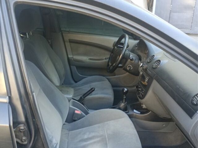 Черный Шевроле Лачетти, объемом двигателя 1.8 л и пробегом 400 тыс. км за 2500 $, фото 14 на Automoto.ua