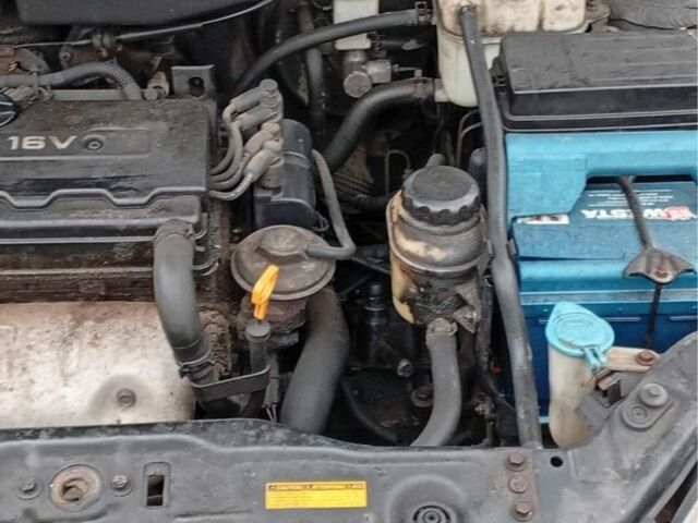 Черный Шевроле Лачетти, объемом двигателя 1.8 л и пробегом 232 тыс. км за 1191 $, фото 2 на Automoto.ua