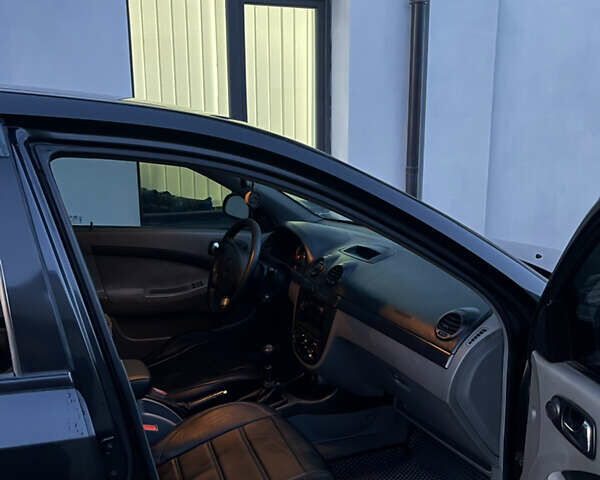 Чорний Шевроле Лачетті, об'ємом двигуна 1.8 л та пробігом 237 тис. км за 3599 $, фото 17 на Automoto.ua