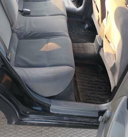 Черный Шевроле Лачетти, объемом двигателя 1.8 л и пробегом 210 тыс. км за 3800 $, фото 12 на Automoto.ua