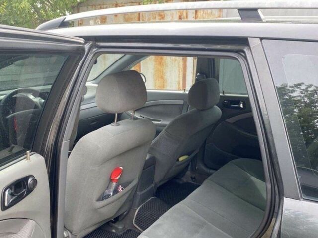 Черный Шевроле Лачетти, объемом двигателя 1.6 л и пробегом 197 тыс. км за 4600 $, фото 4 на Automoto.ua