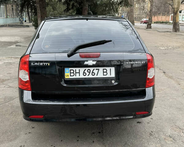 Черный Шевроле Лачетти, объемом двигателя 1.8 л и пробегом 175 тыс. км за 4500 $, фото 2 на Automoto.ua