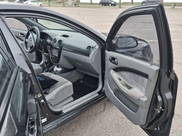 Черный Шевроле Лачетти, объемом двигателя 1.8 л и пробегом 335 тыс. км за 4000 $, фото 19 на Automoto.ua