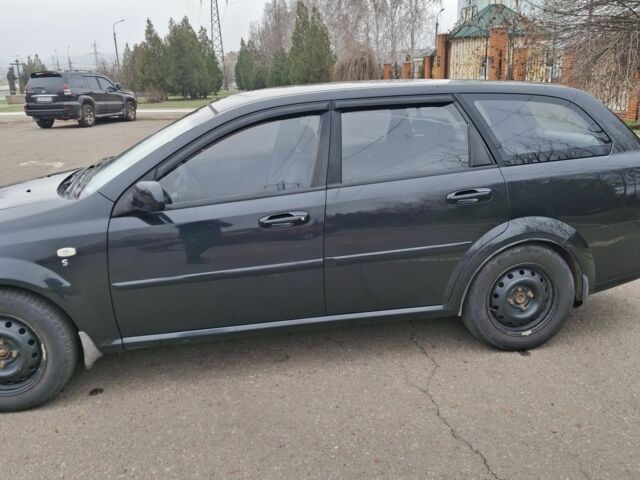 Черный Шевроле Лачетти, объемом двигателя 1.8 л и пробегом 335 тыс. км за 4000 $, фото 1 на Automoto.ua