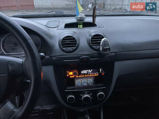 Чорний Шевроле Лачетті, об'ємом двигуна 1.8 л та пробігом 285 тис. км за 3999 $, фото 21 на Automoto.ua