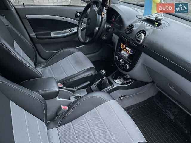 Чорний Шевроле Лачетті, об'ємом двигуна 1.8 л та пробігом 285 тис. км за 3999 $, фото 13 на Automoto.ua