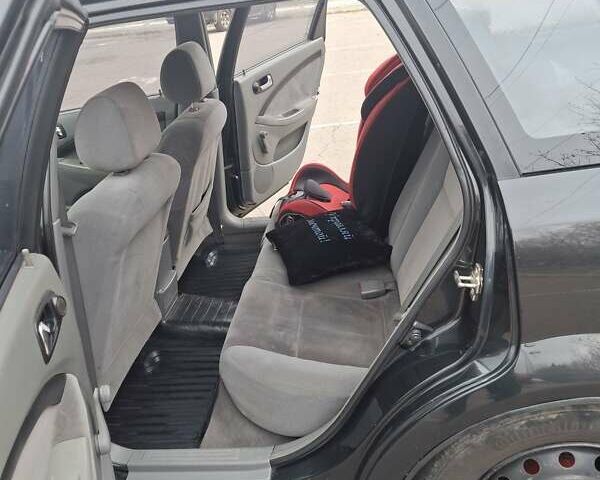 Черный Шевроле Лачетти, объемом двигателя 1.8 л и пробегом 335 тыс. км за 4000 $, фото 27 на Automoto.ua